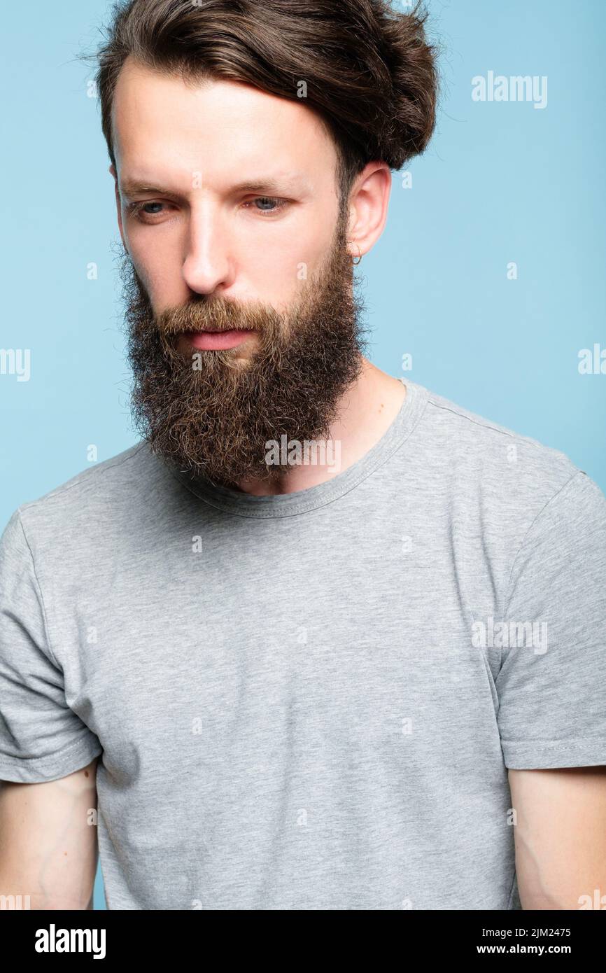 sad depressed disappointed sullen dull hipster man Stock Photo