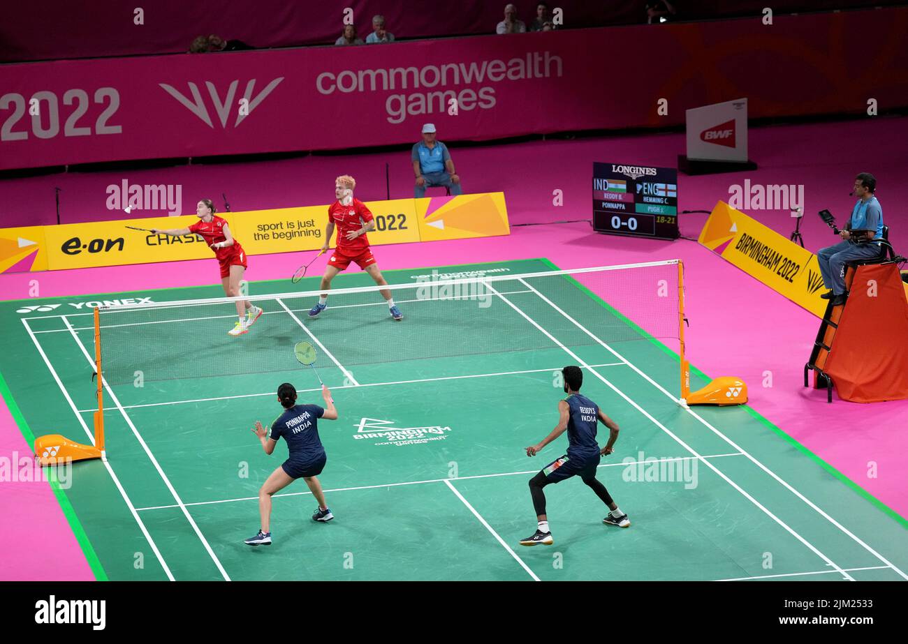 England's Jessica Pugh and Callum Hemming (top) during their match against India's Ashwini Ponnappa and B.sumeeth Reddy at The NEC on day seven of the 2022 Commonwealth Games in Birmingham. Picture date: Thursday August 4, 2022. Stock Photo