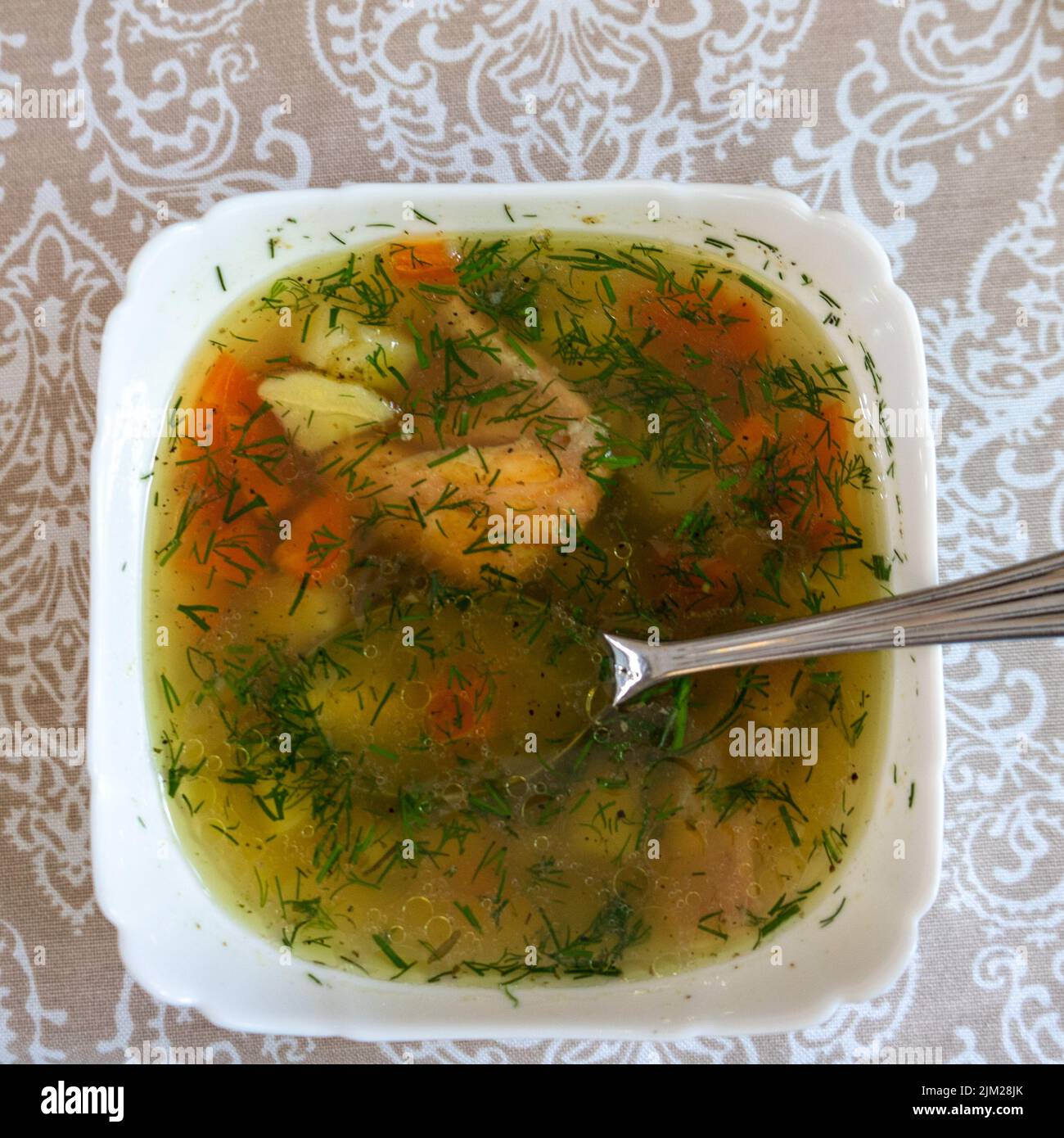 Salmon fish soup with vegetables Stock Photo Alamy