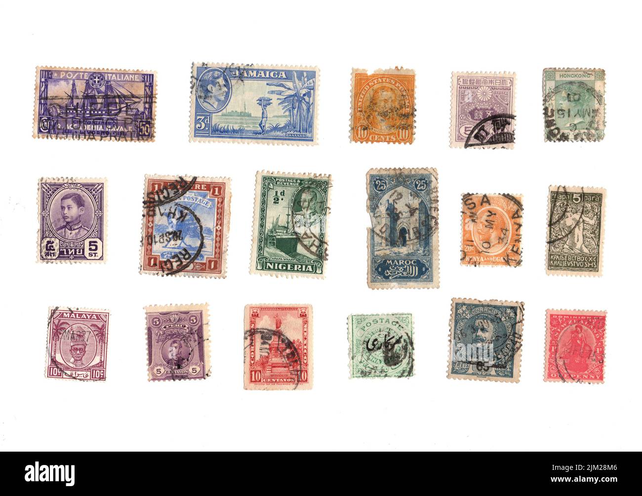 A selection of old postage stamps from around the world on a white ...