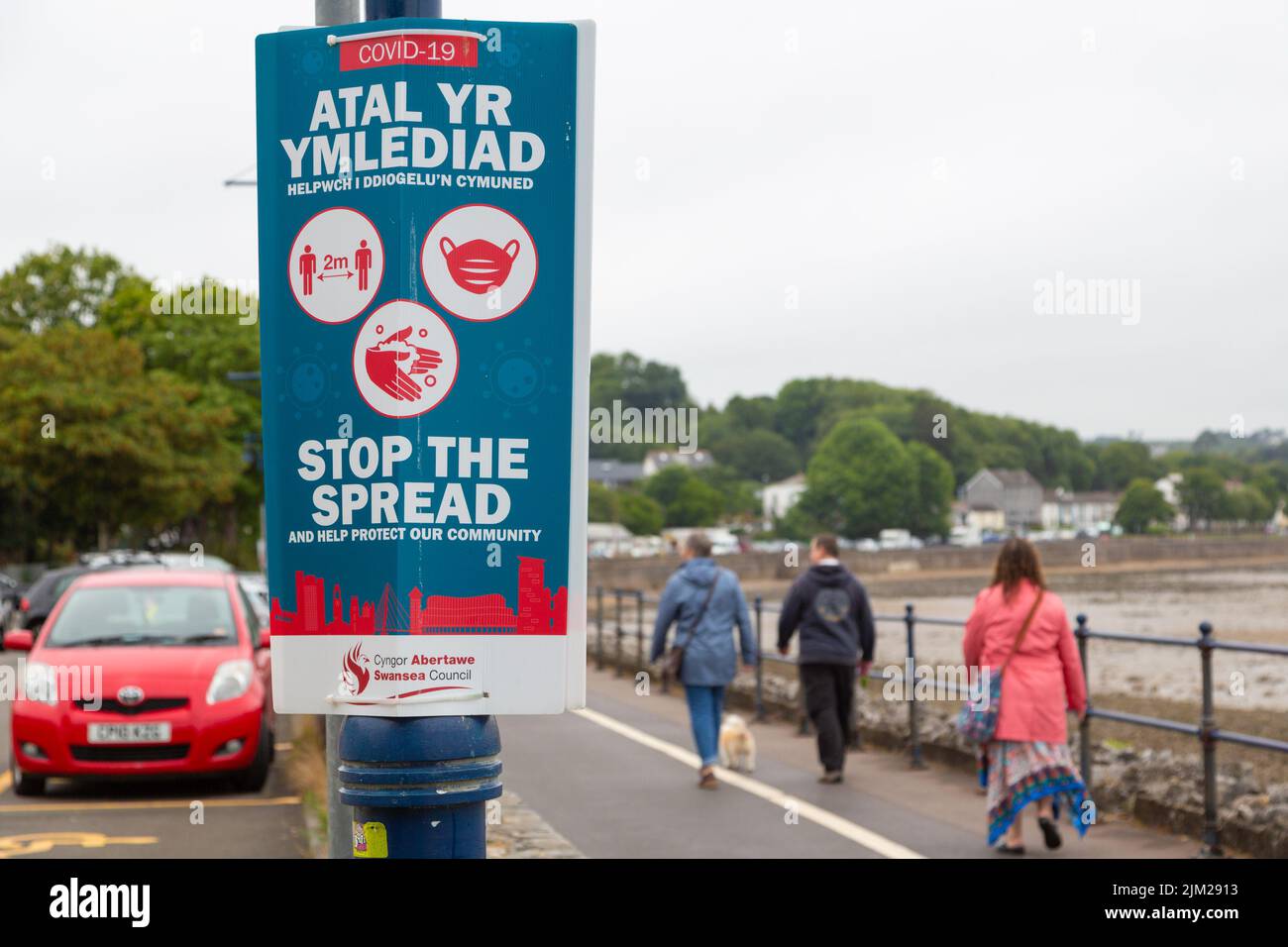 Welsh sign for covid 19, atal yr ymlediad, stop the spread, mumbles, wales Stock Photo