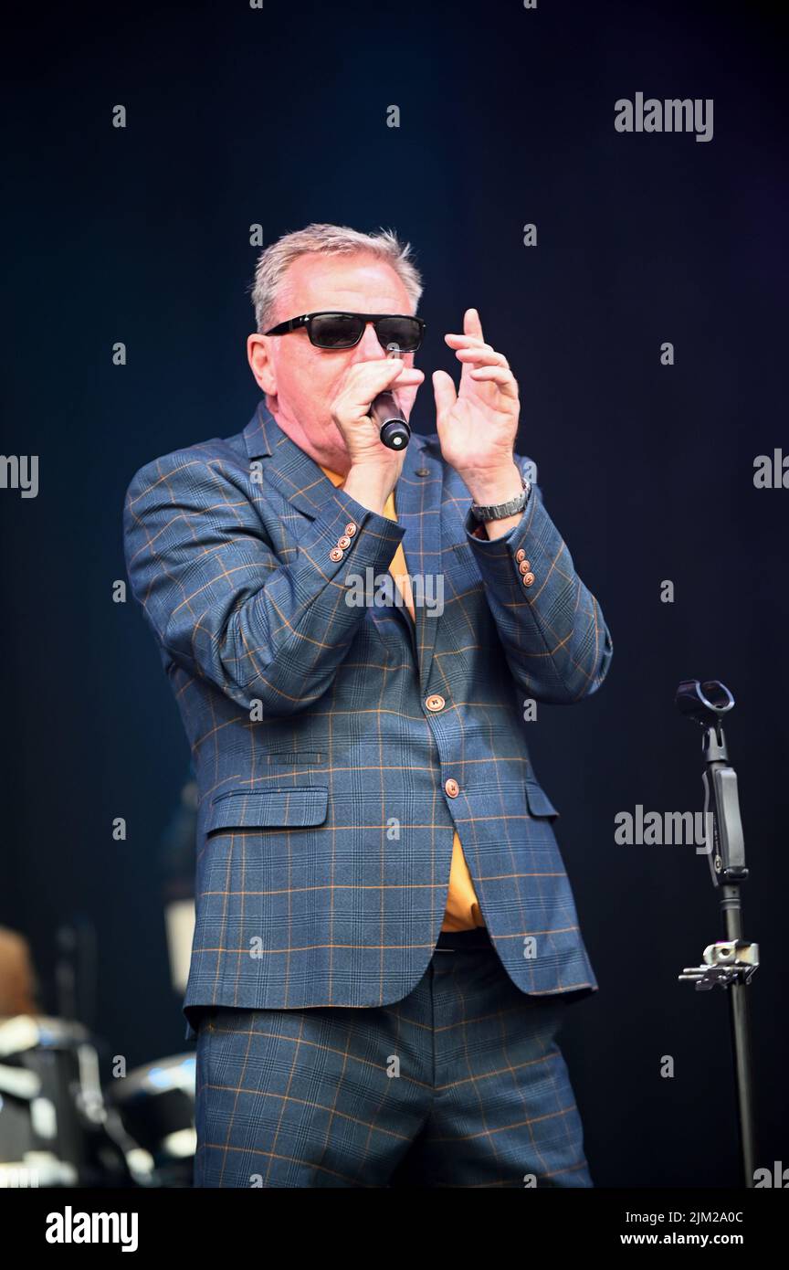 Lead Singer, Graham McPherson, known by his stage name Suggs, performs