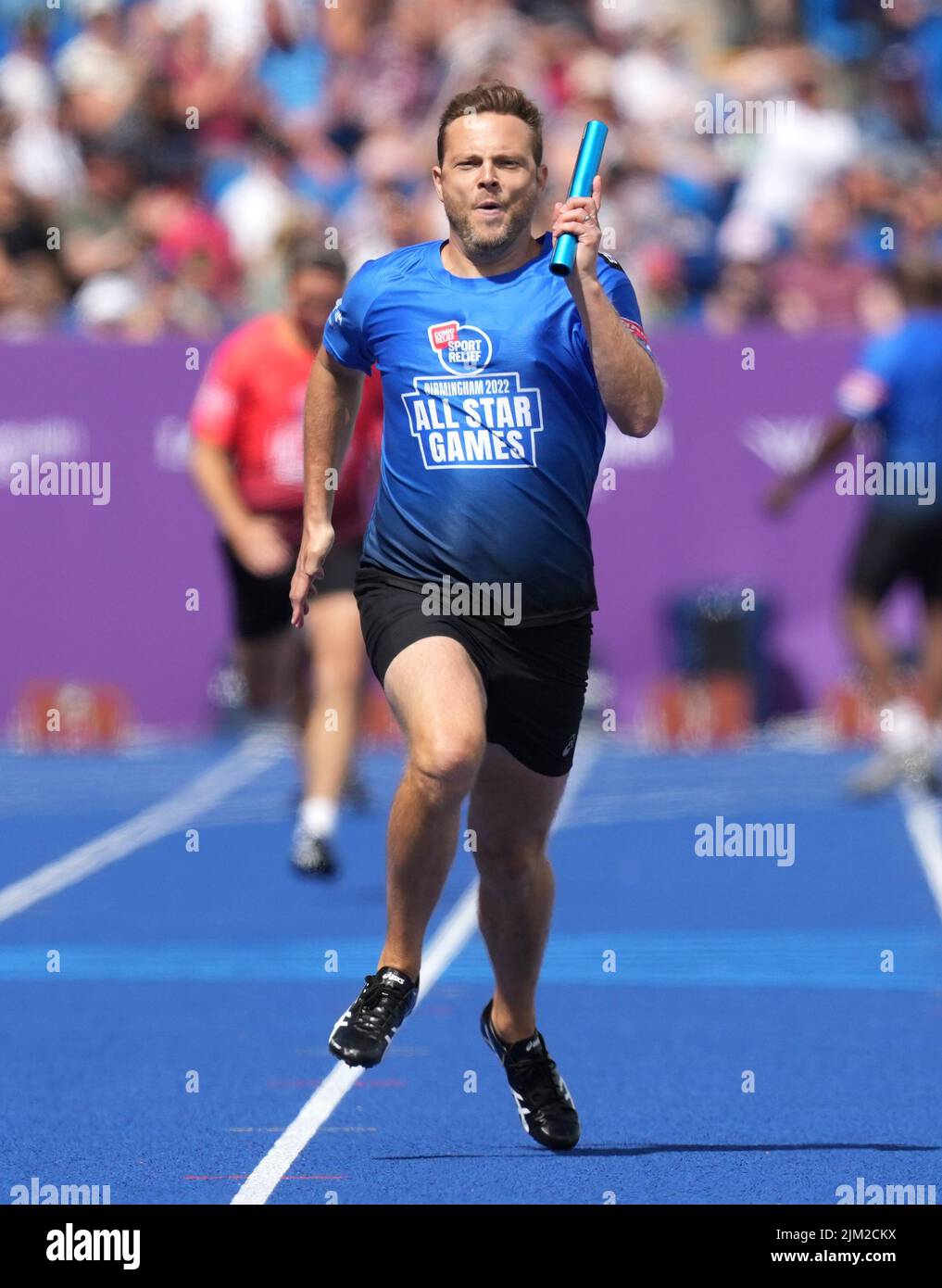 Team Blue's Mark Rhodes in action during the Sport Relief 4x100 metres relay at Alexander Stadium on day seven of the 2022 Commonwealth Games in Birmingham. Picture date: Thursday August 4, 2022. Stock Photo