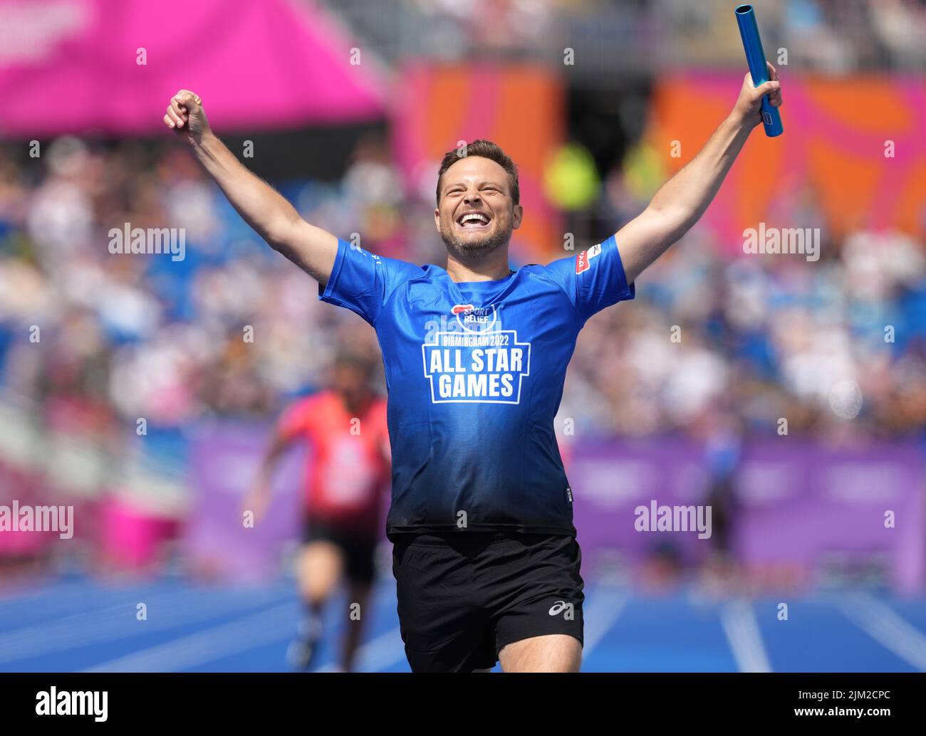 Team Blue's Mark Rhodes in action during the Sport Relief 4x100 metres relay at Alexander Stadium on day seven of the 2022 Commonwealth Games in Birmingham. Picture date: Thursday August 4, 2022. Stock Photo
