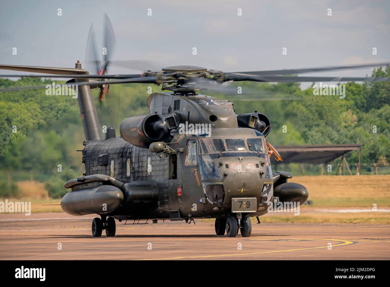 German Air Force, Sikorsky CH-53 Heavy Lift Transport Helicopter arrival at the Royal International Air Tattoo for static display. Stock Photo