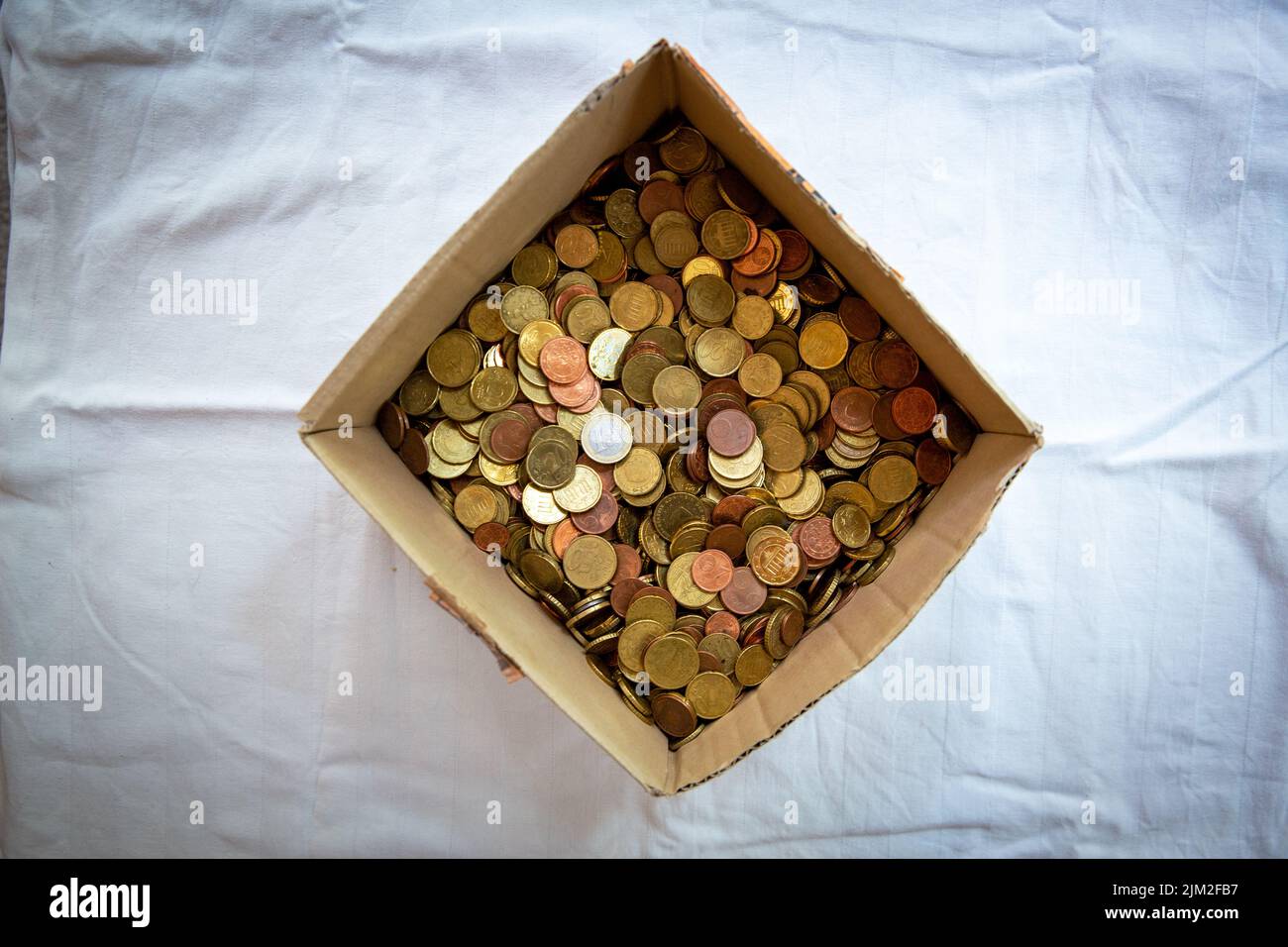 A Box Filled With Coin Money, Eurocent Coins, Euro And Cent - Coins, Bird S Eye View Stock Photo