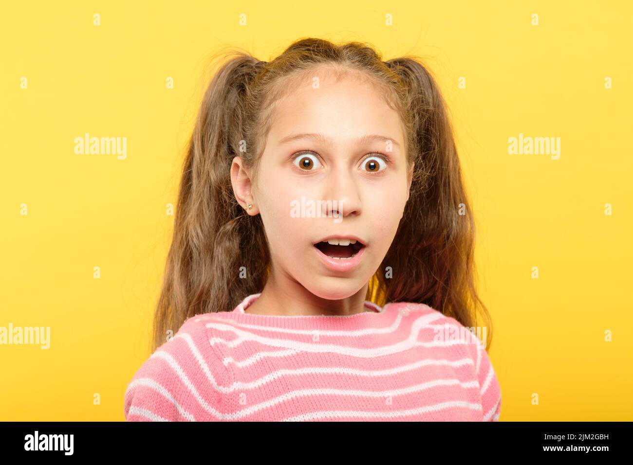 surprised astonished overwhelmed girl reaction Stock Photo