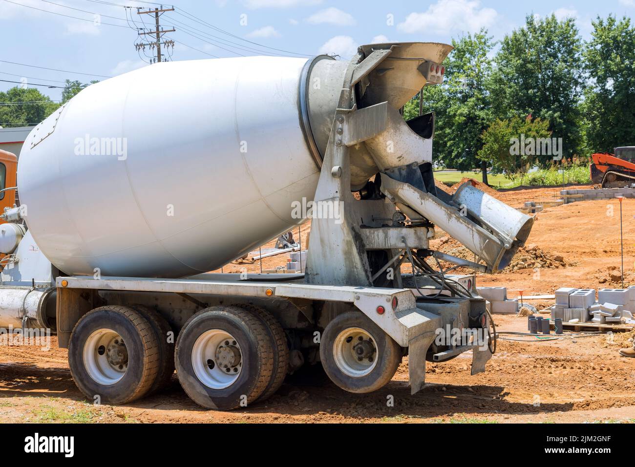Delivery concrete mixer truck the fresh concrete for preparing to pour