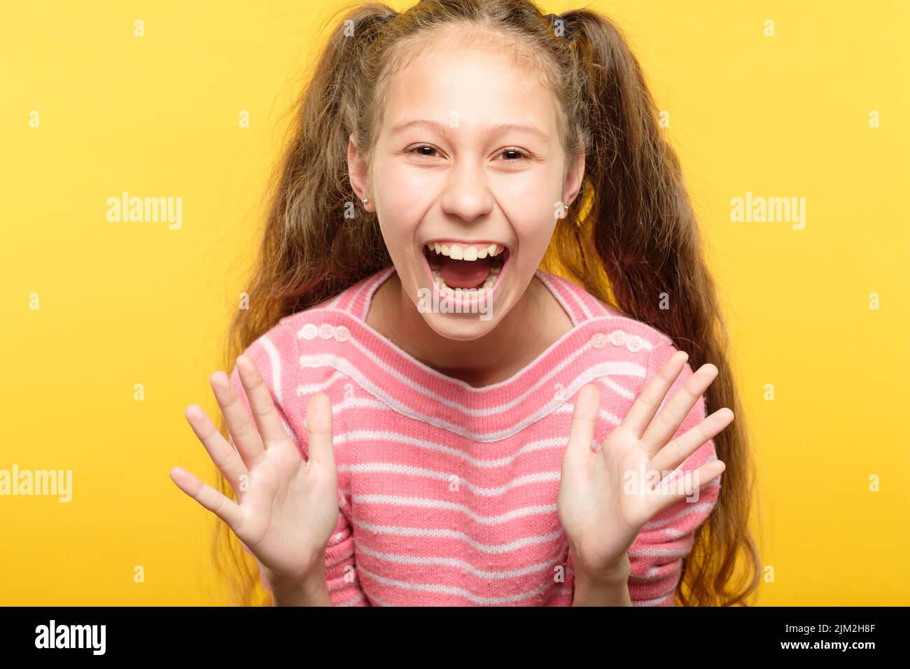 overexcited enthusiastic laughing girl portrait Stock Photo