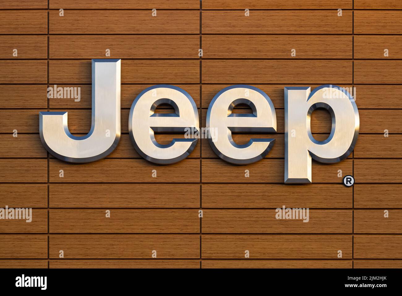 Jeep logo brushed-metal signage at a Jeep dealership in Metro Atlanta, Georgia. (USA) Stock Photo
