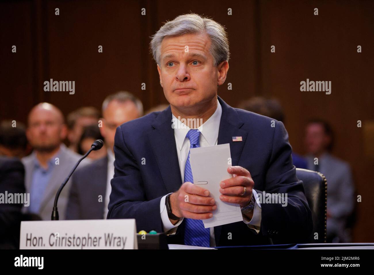 FBI Director Christopher Wray looks on as he testifies before a Senate Judiciary Committee hearing entitled 'Oversight of the Federal Bureau of Investigation,' on Capitol Hill in Washington, U.S. August 4, 2022. REUTERS/Jim Bourg Stock Photo