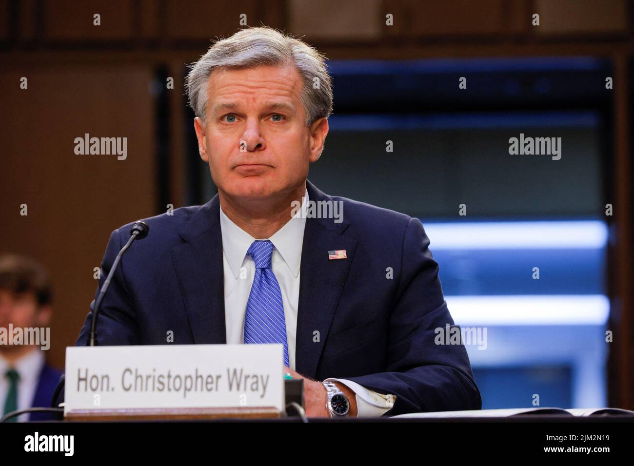 FBI Director Christopher Wray looks on as he testifies before a Senate Judiciary Committee hearing entitled 'Oversight of the Federal Bureau of Investigation,' on Capitol Hill in Washington, U.S. August 4, 2022. REUTERS/Jim Bourg Stock Photo