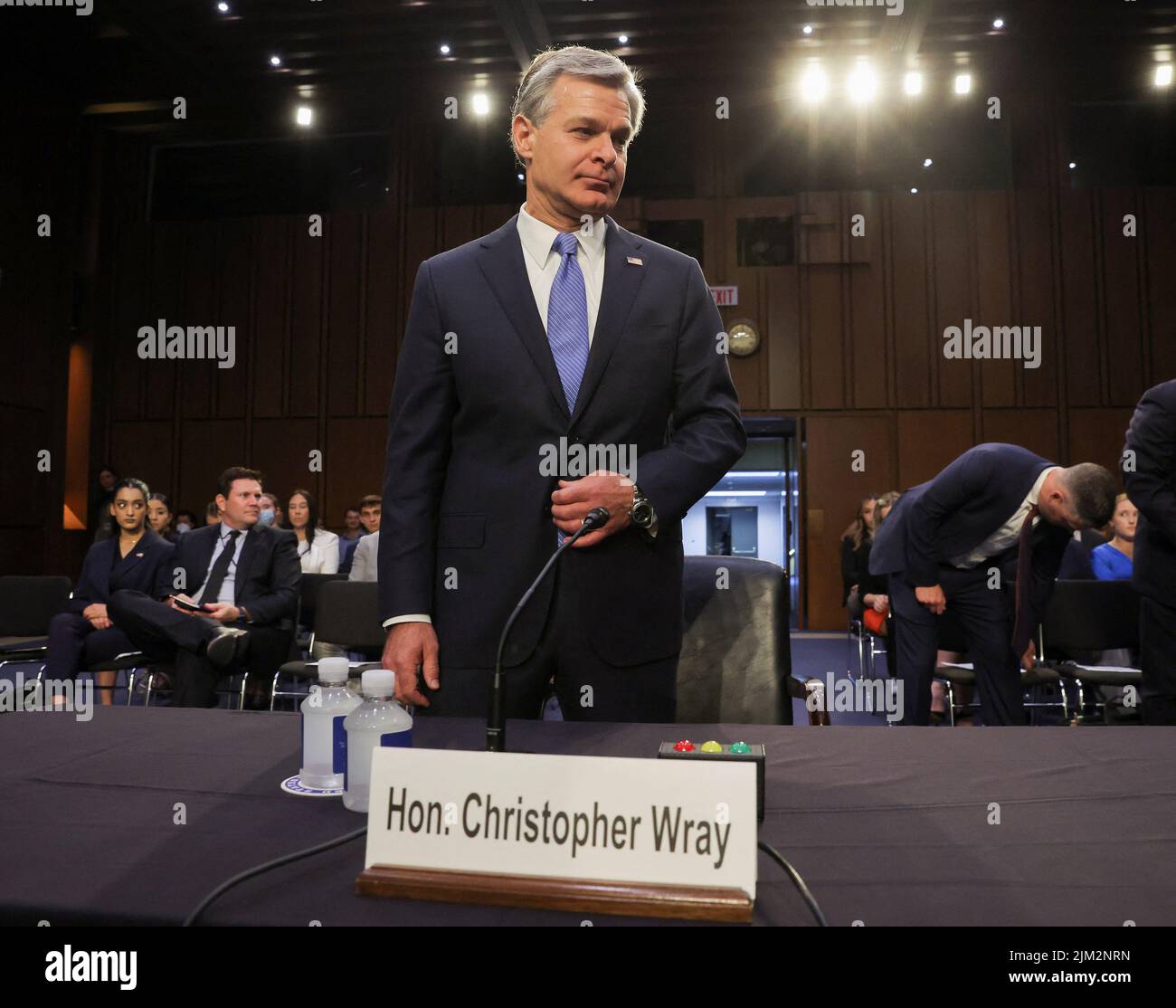FBI Director Christopher Wray takes his seat to testify before a Senate Judiciary Committee hearing entitled 'Oversight of the Federal Bureau of Investigation,' on Capitol Hill in Washington, U.S. August 4, 2022. REUTERS/Jim Bourg Stock Photo