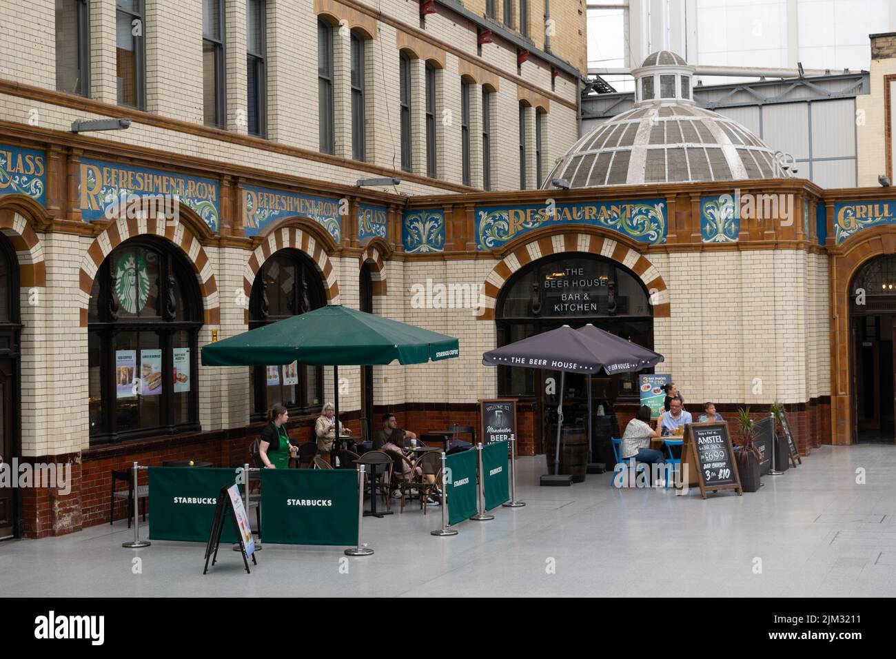 Starbucks, Manchester Victoria train station. Historic first class waiting rooms. Manchester UK Stock Photo