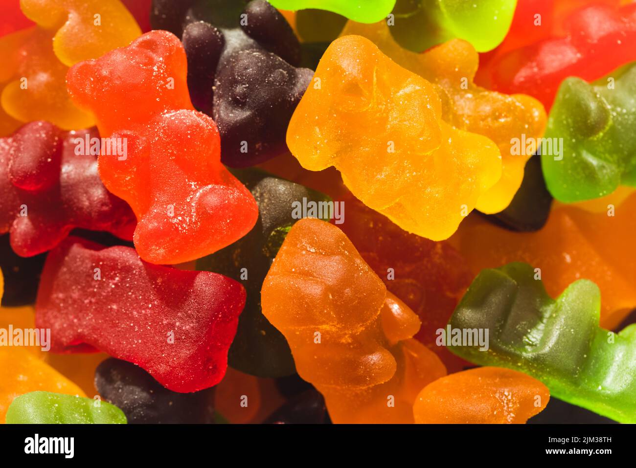 Close-up full frame shot of multi colored gummy bears pile Stock Photo
