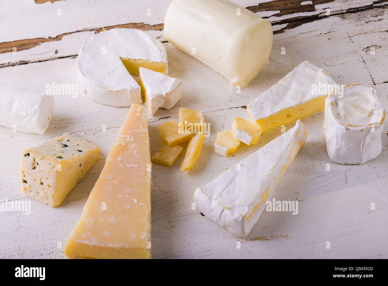 High angle view of various cheese on table, copy space. unaltered, food and dairy product. Stock Photo