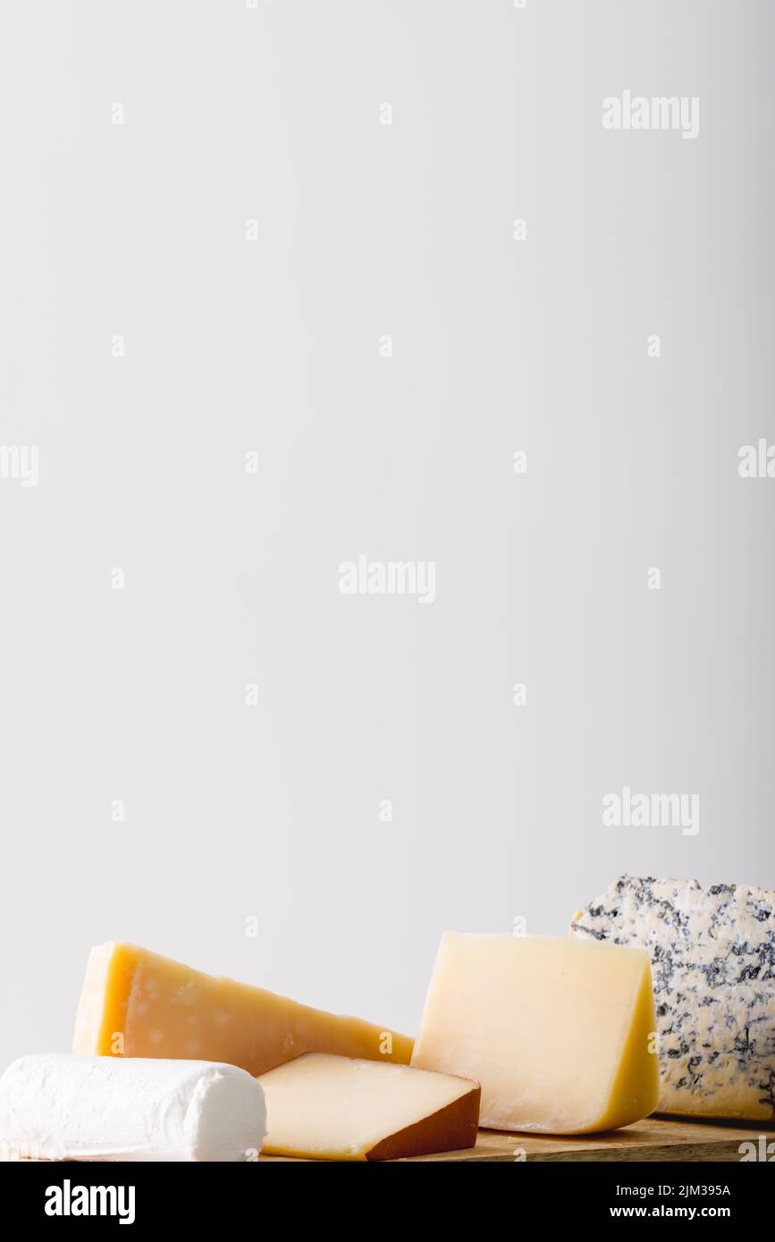 Various cheese against white background with copy space Stock Photo