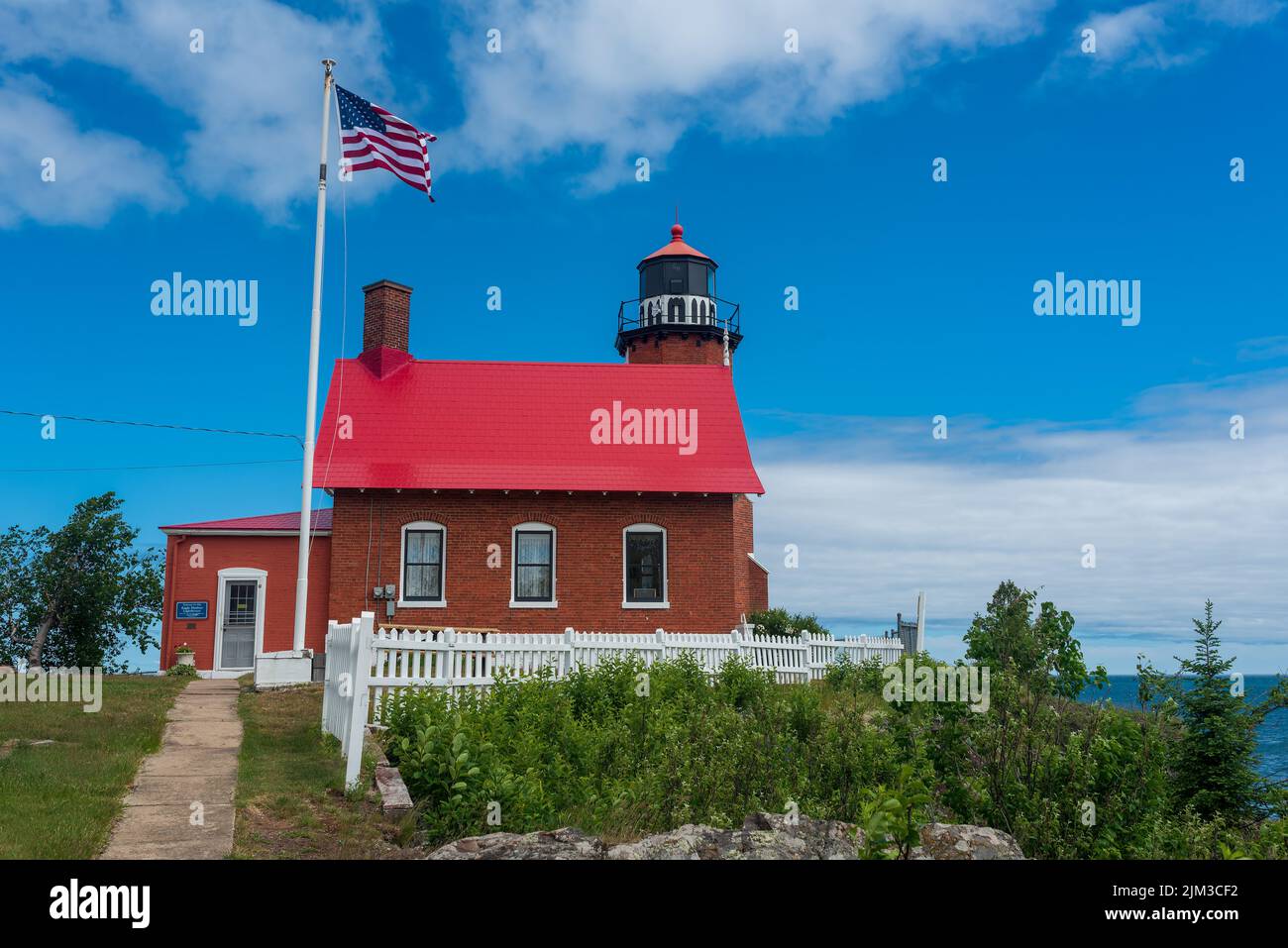 Sidewalk leading to the Eagle Harbor Lighthouse Museum Stock Photo Alamy