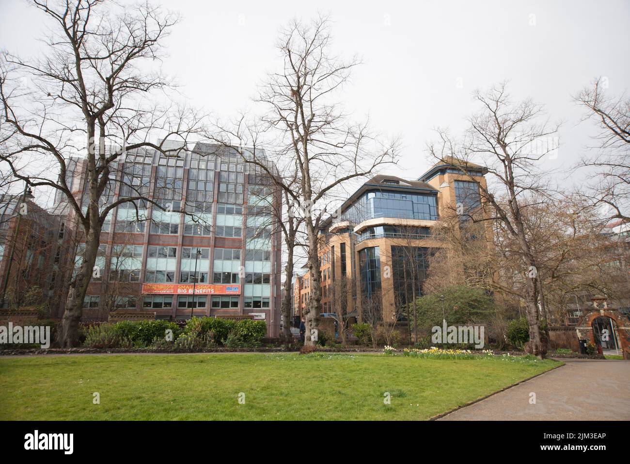 Buildings by Forbury Park in Reading, Berkshire in the UK Stock Photo