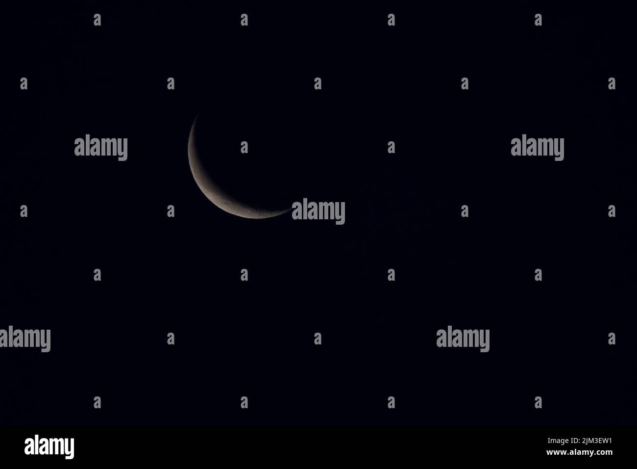 view of night sky with new Moon Stock Photo