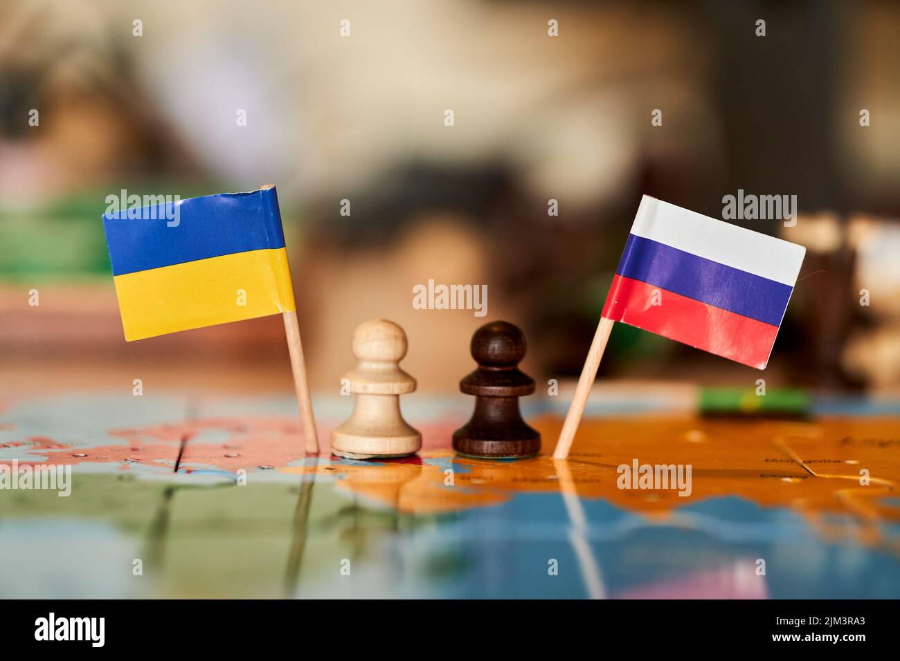 The Chess pieces as a symbol of the conflict between Russia and Ukraine Stock Photo