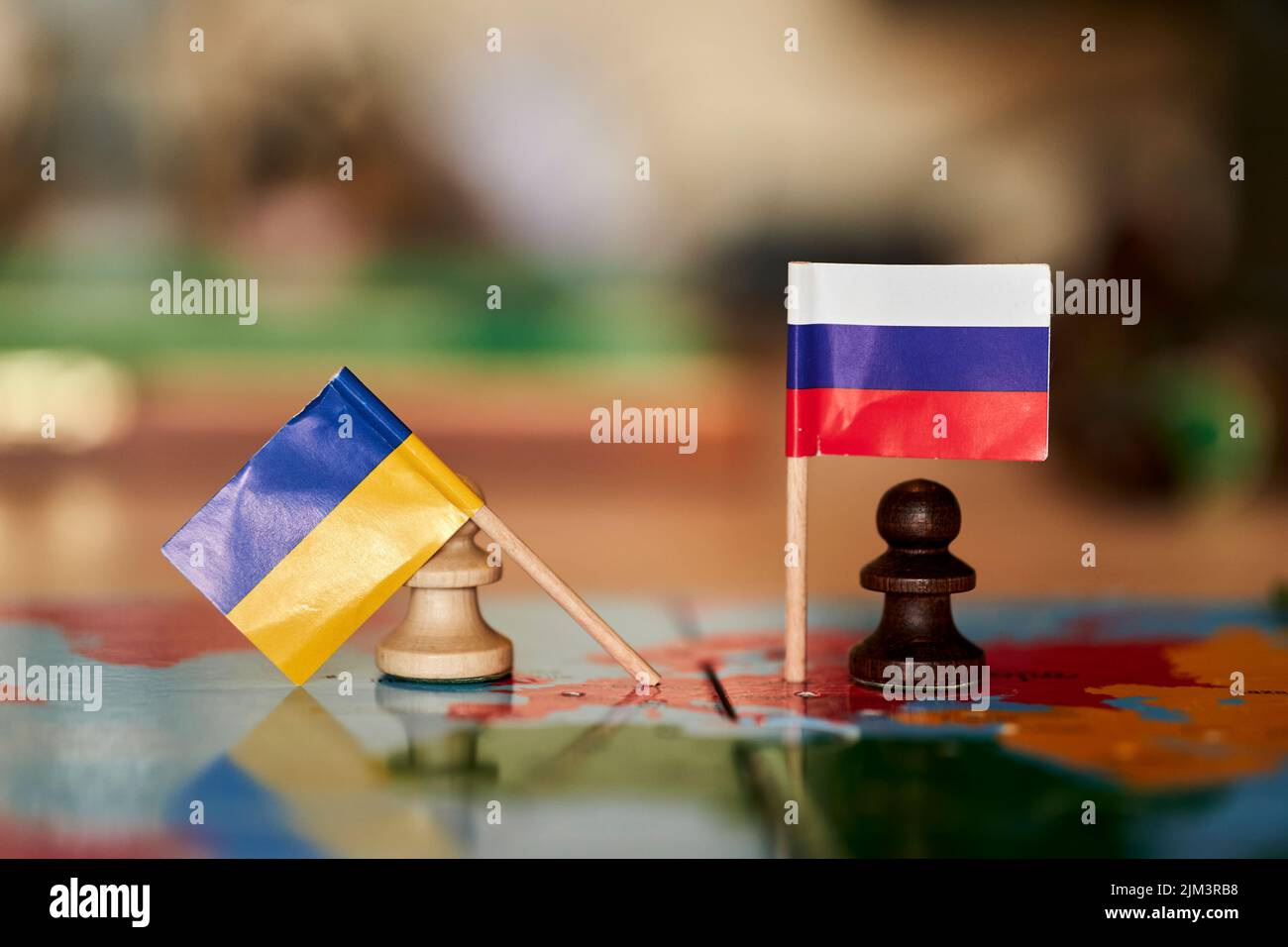 The Chess pieces as a symbol of the conflict between Russia and Ukraine Stock Photo