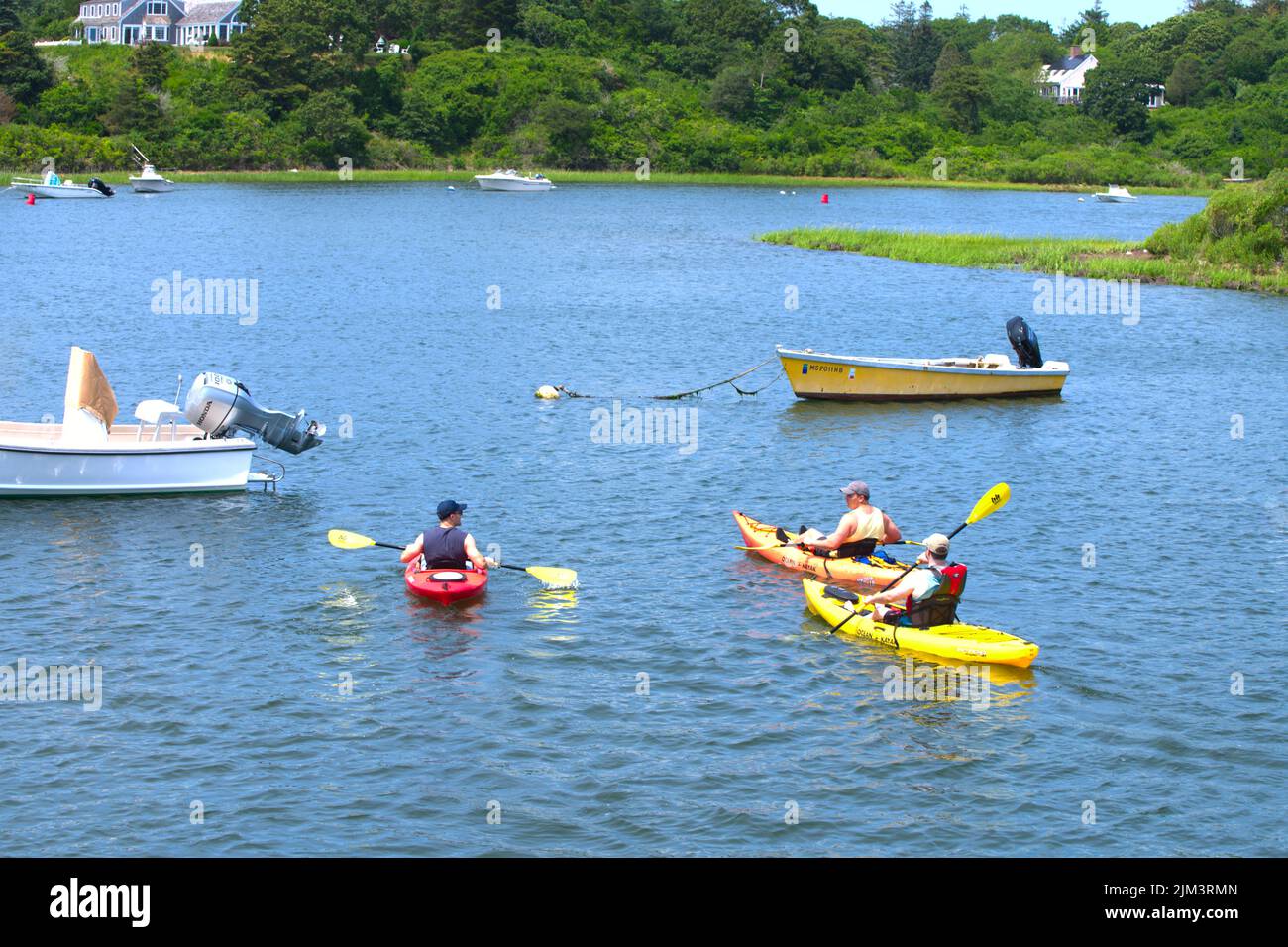 Kayakers entering Mill Pond Inlet in Chatham, Massachusetts, on Cape Cod, USA Stock Photo