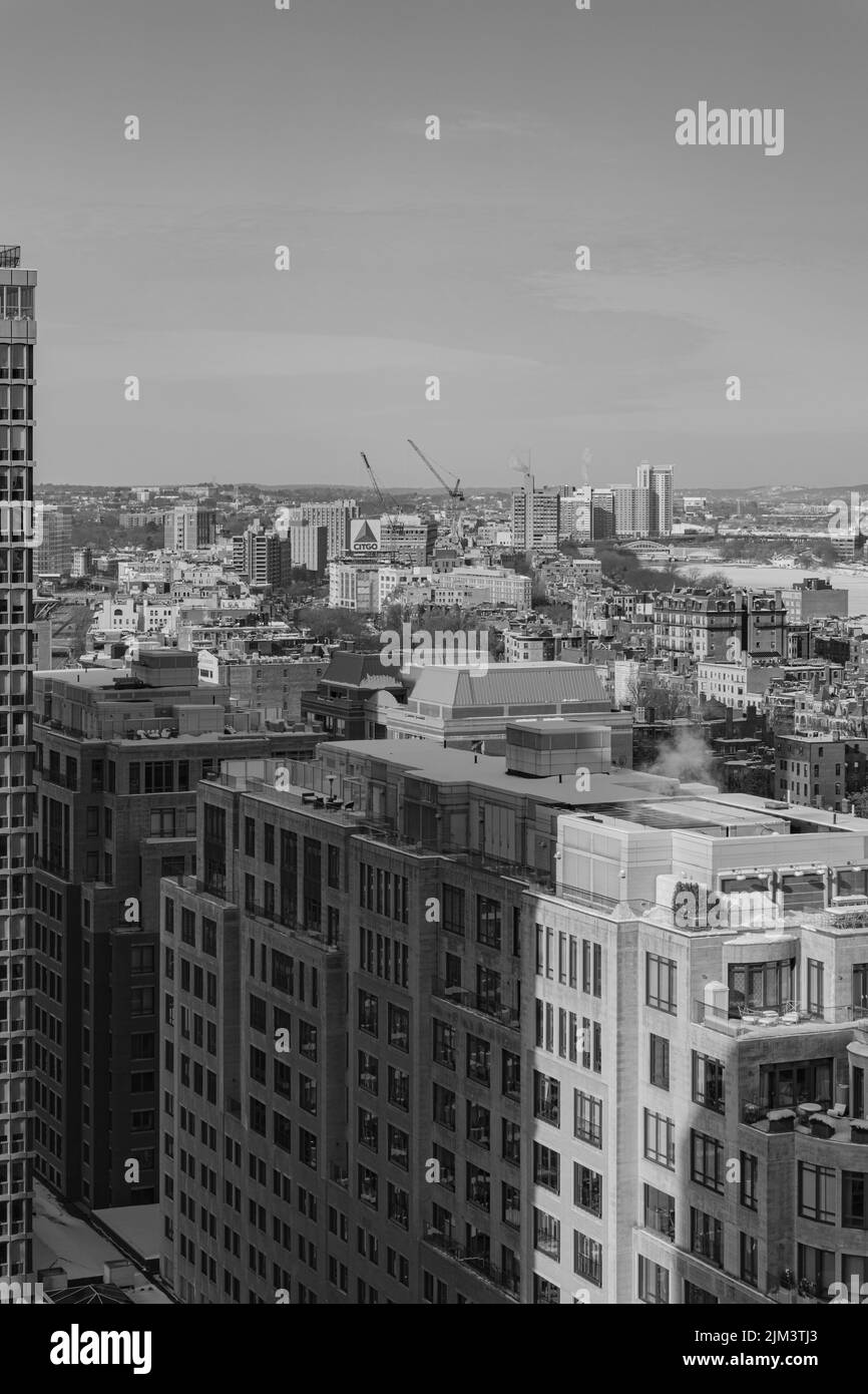 An aerial grayscale shot of the skyline of the city of Boston on a sunny day, Massachusetts, United States Stock Photo