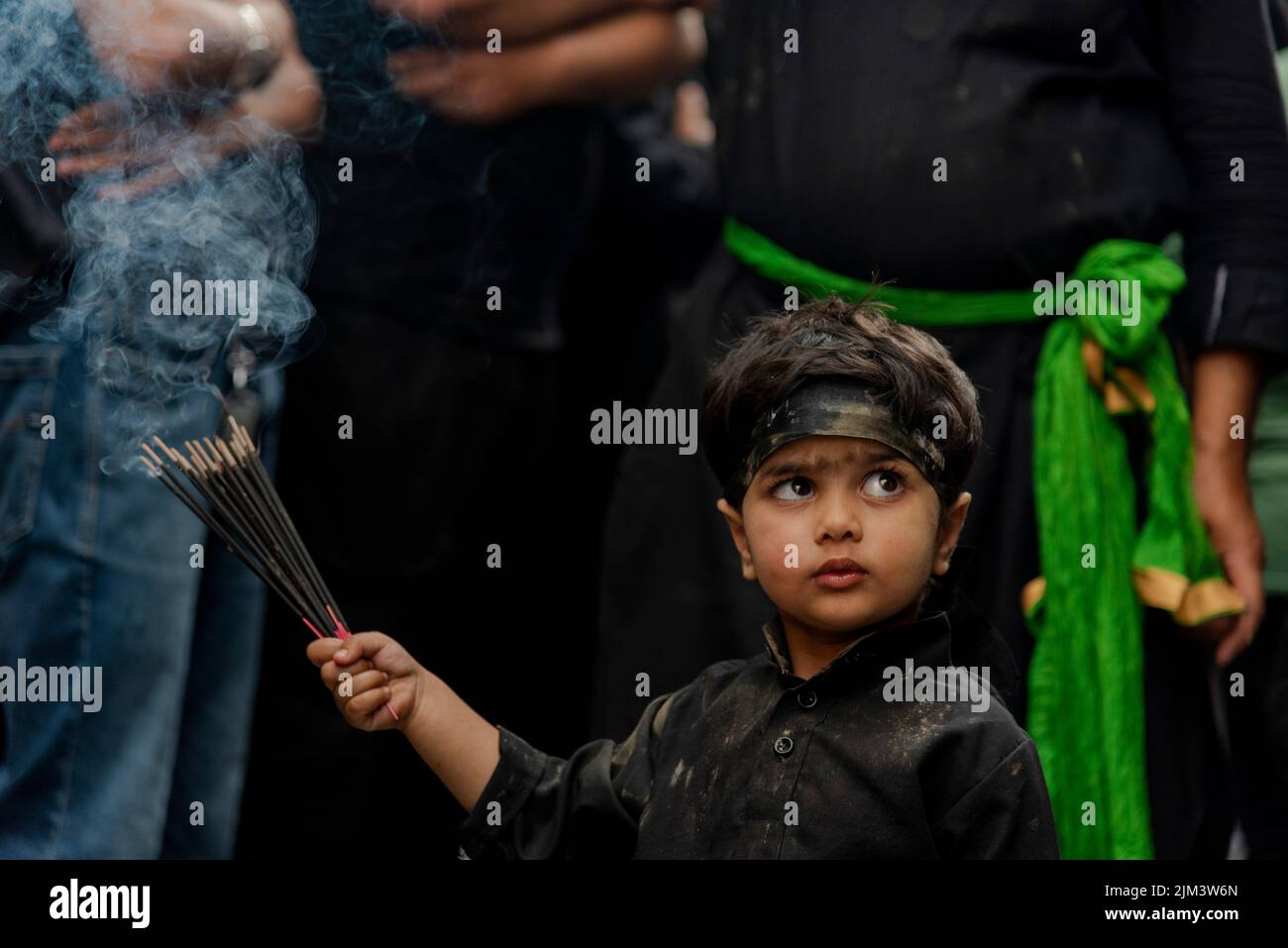 Srinagar, India. 04th Aug, 2022. A Kashmiri Shia Muslim boy holds