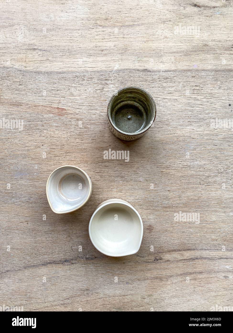 Handmade Stoneware Jugs and Cup from above Stock Photo Alamy