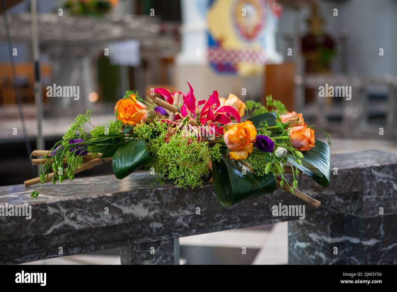 Bridal Impressions, colorful floral decoration at the altar during the wedding ceremony at the church. High quality photo Stock Photo