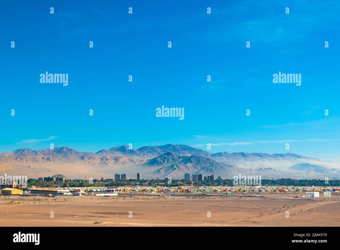 Aerial view of the mining city of Calama in northern Chile with Chuquicamata copper mine in the back. Stock Photo