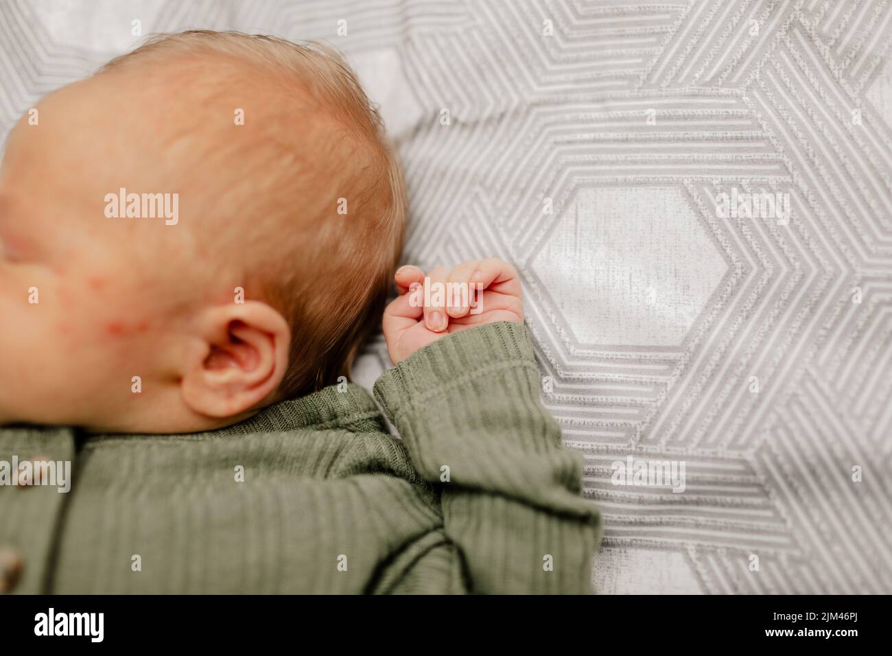 a-one-week-old-baby-lying-in-bed-stock-photo-alamy
