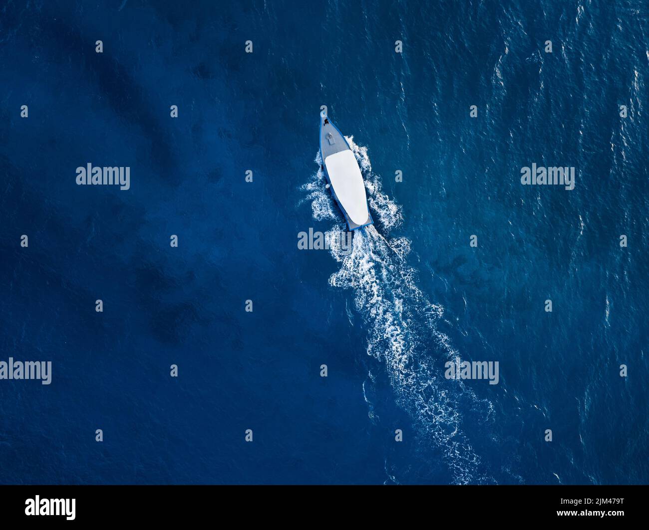 An aerial view of a boat sailing in the sea Stock Photo - Alamy