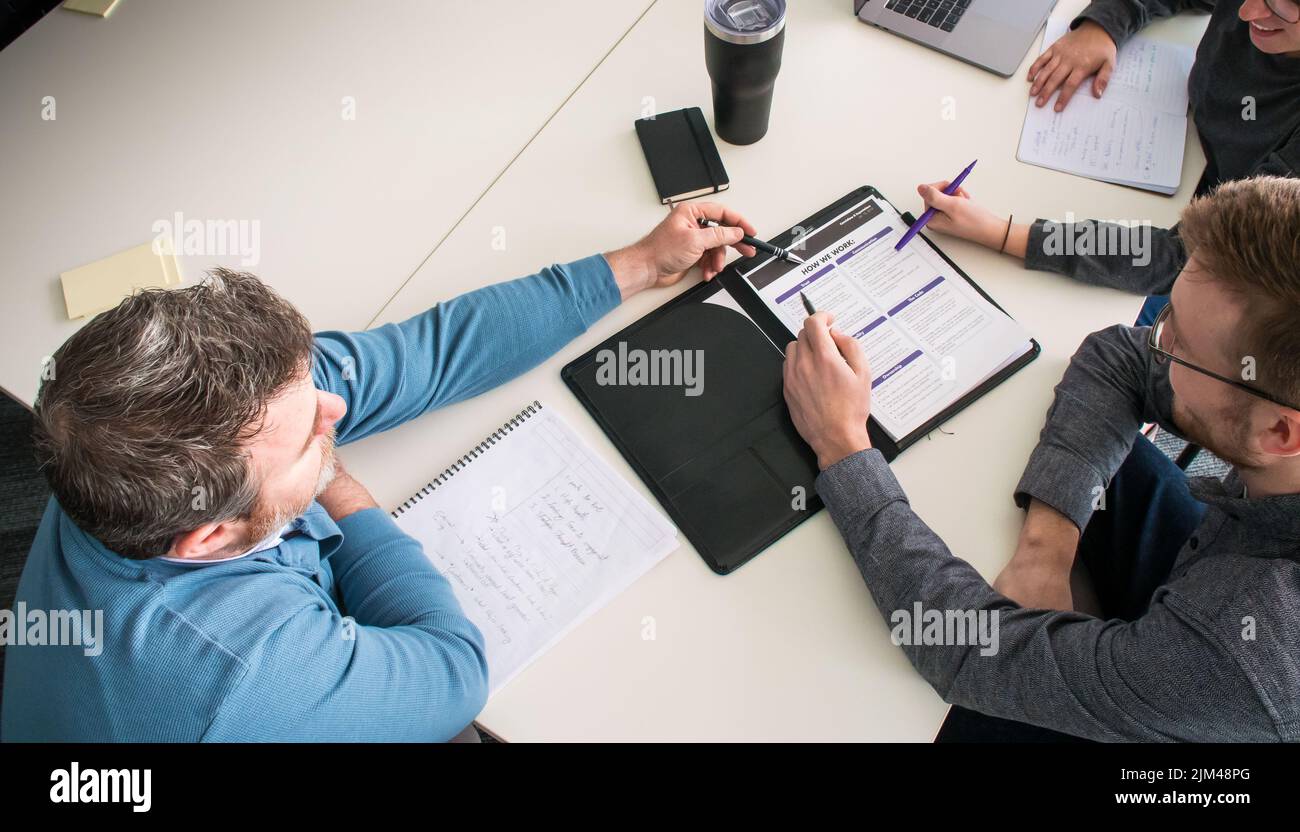 Huddle Top View Business meeting top view hi-res stock photography and images - Alamy