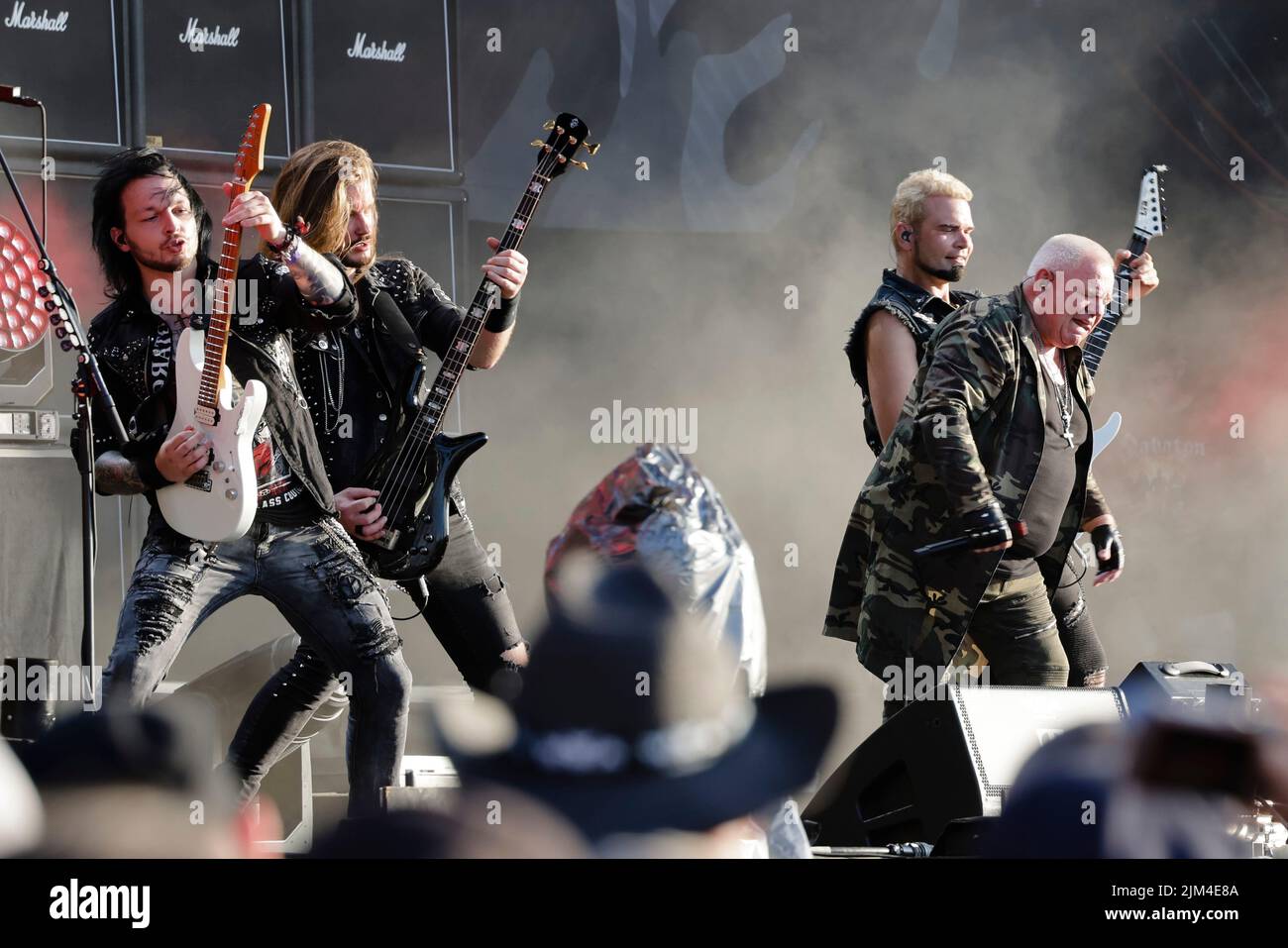 Wacken, Germany. 04th Aug, 2022. Guitarist Richie Faulkner (l) and singer  Robert Halford stand together during a performance of the British band  "Judas Priest" at WOA - Wacken Open Air. The WOA