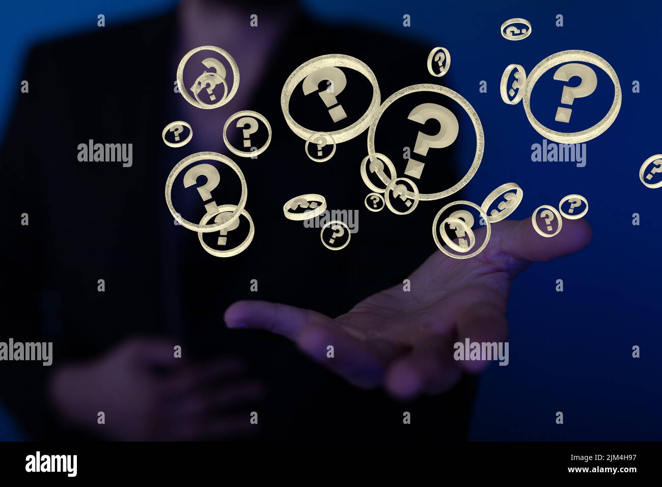 A closeup of illustrated question icons near a hand Stock Photo - Alamy
