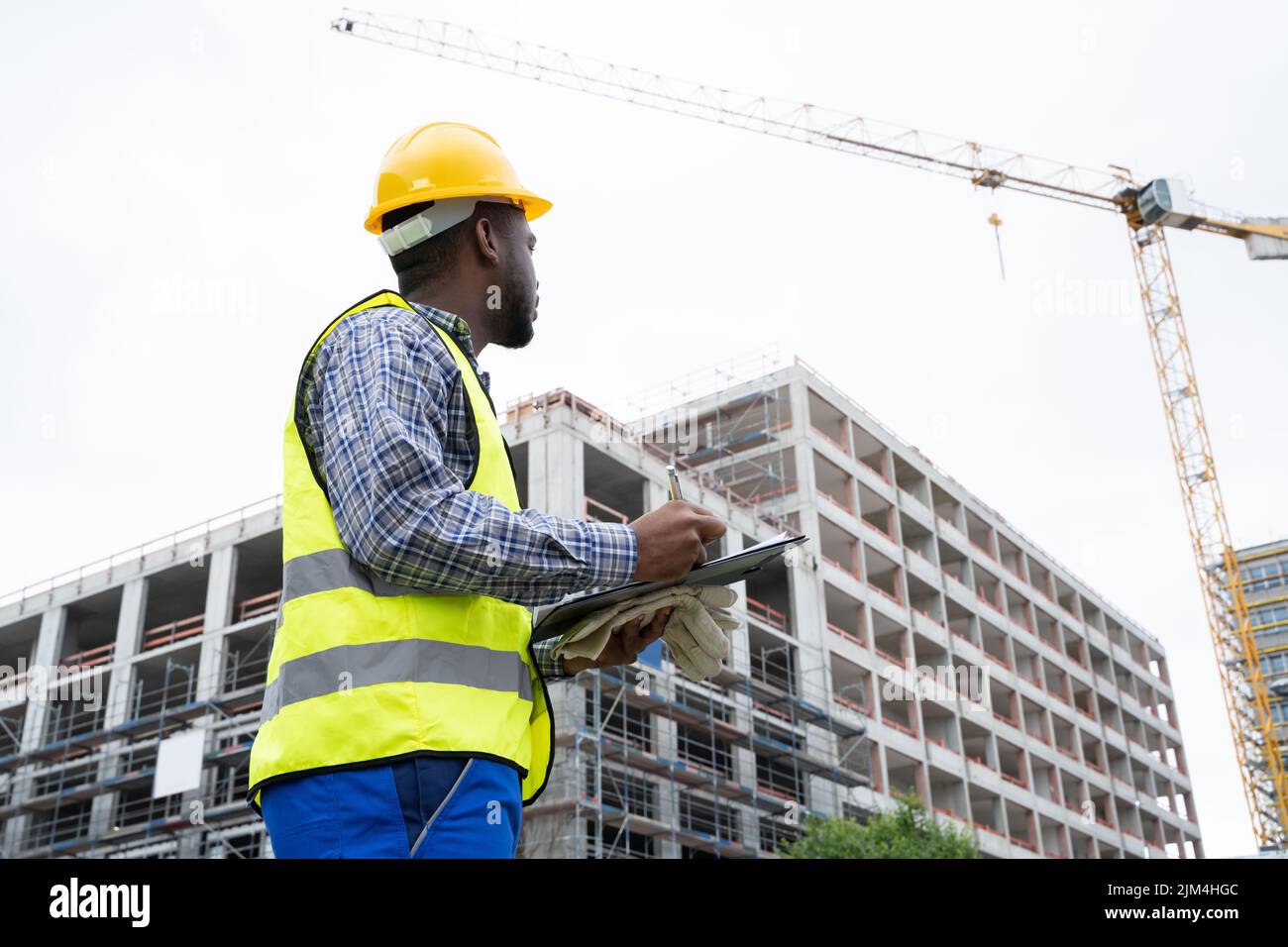 OSHA Inspection Worker At Construction Site. Building Safety Stock Photo