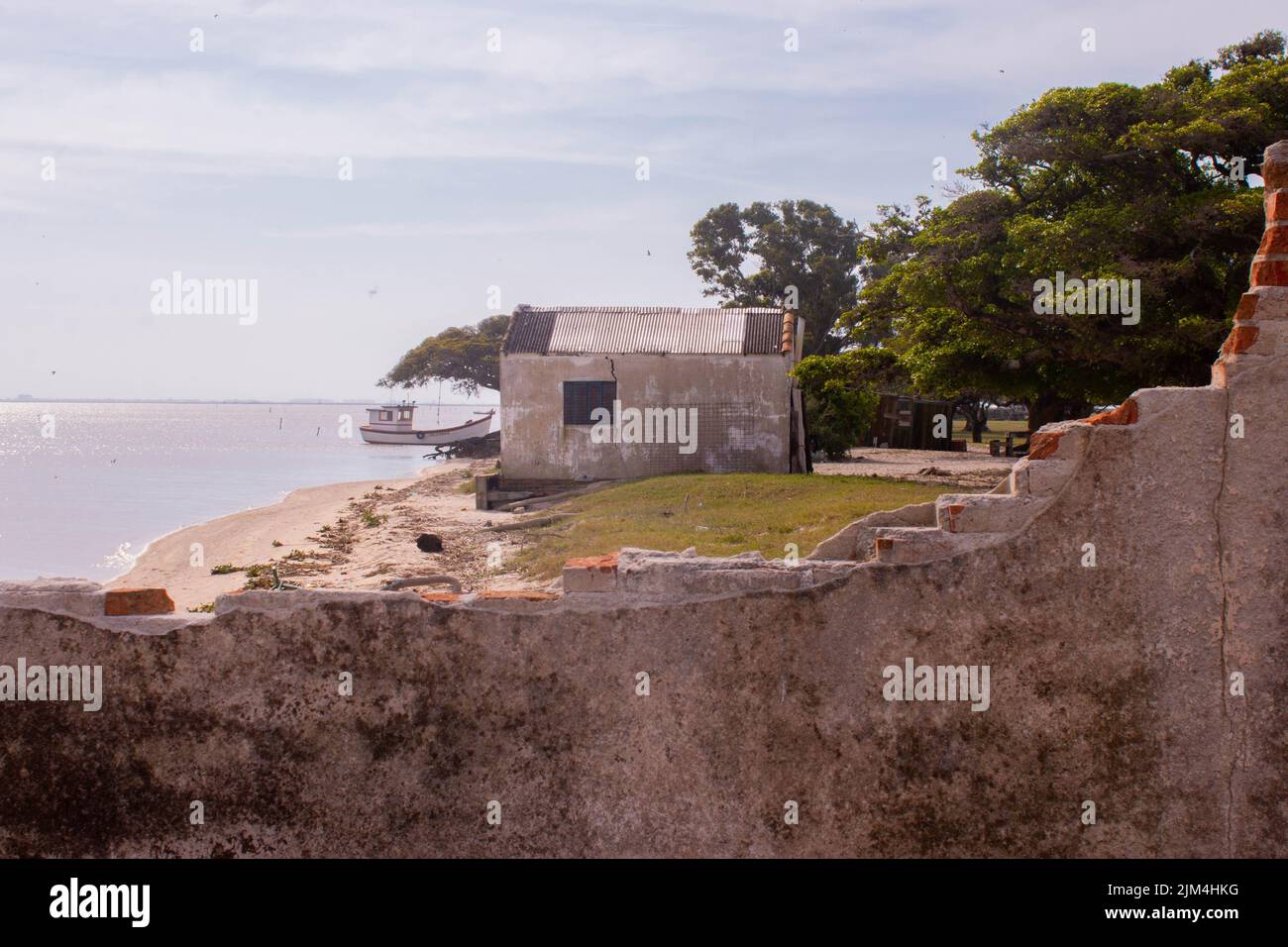 Ruins of a house by the sea Stock Photo
