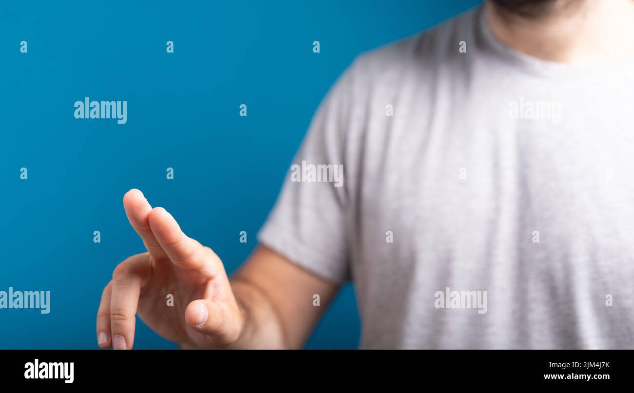 Male clicking on blue hi-res stock photography and images - Alamy