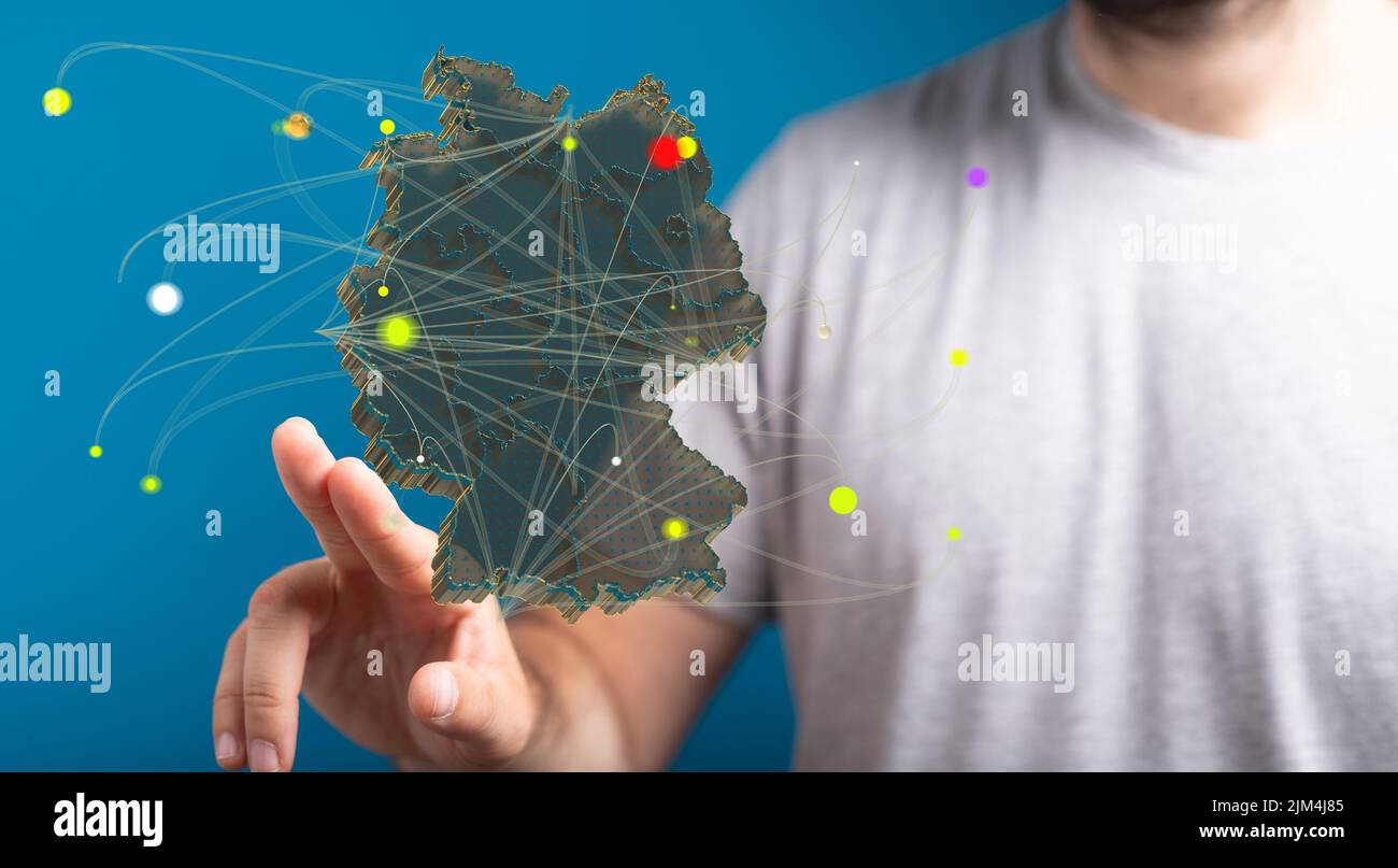 A male touching a digital hologram of the German map with dots and a