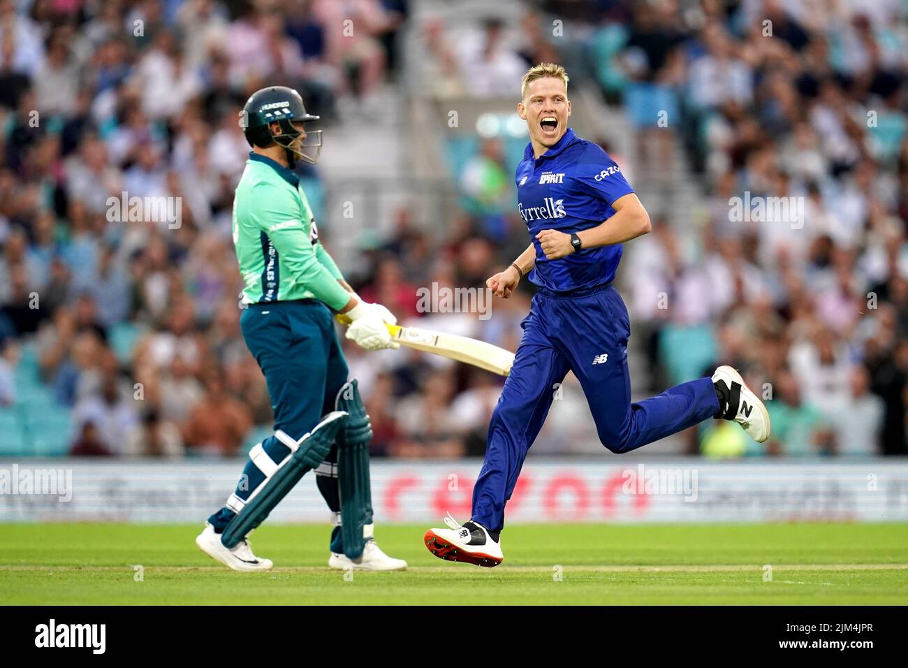 Oval Invincible's Jason Roy is out for 0 as London Spirit's Nathan Ellis, (right) celebrates taking his wicket during The Hundred match at The Kia Oval, London. Picture date: Thursday August 4, 2022. Stock Photo