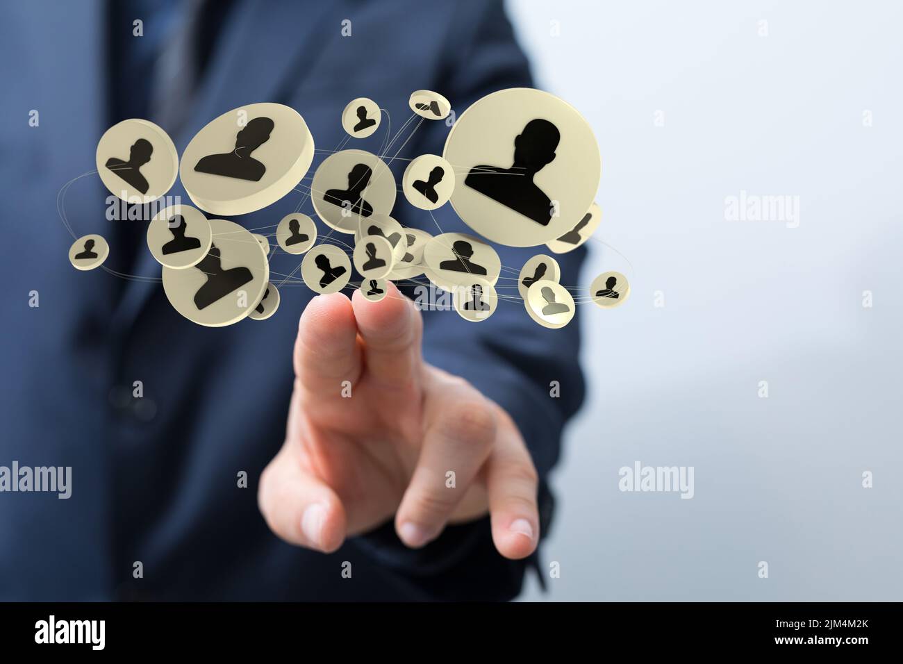 A person pointing at a 3D rendering of profile icons Stock Photo - Alamy