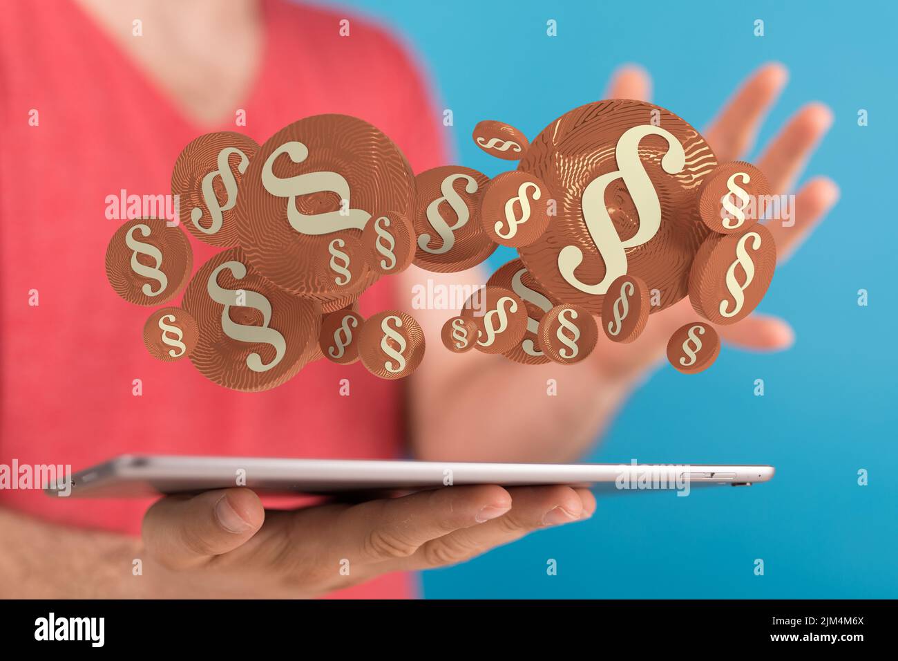 A 3D render of section signs levitating above a tablet in a person's ...