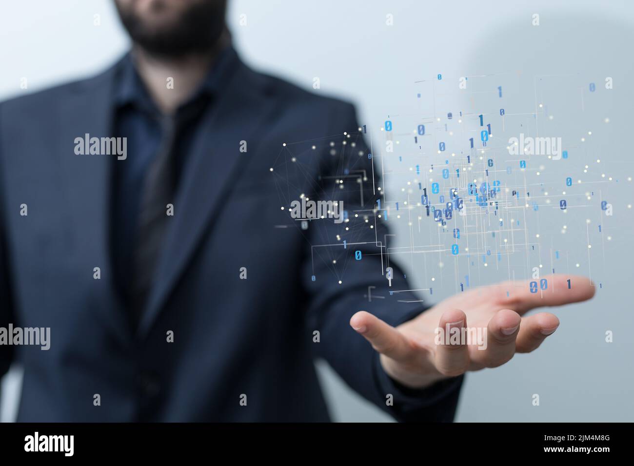 A 3D rendering of a binary code levitating in the air above a person's ...