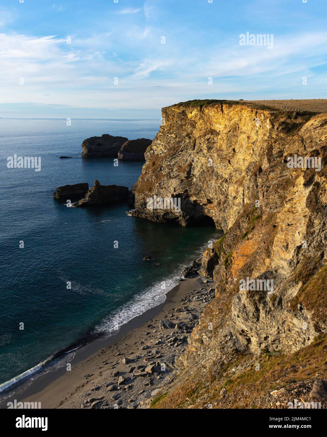 Cliff on the Cornwall coast lit by afternoon light.Beautiful landscape scenery. Stock Photo