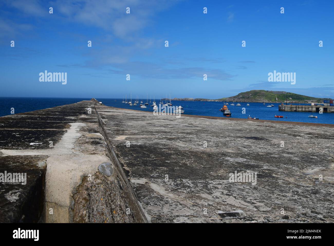 The 910m long breakwater was built by the Admiralty to protect Royal Navy ships in the harbour, it was completed in 1864, Alderney, Channel Islands, G Stock Photo