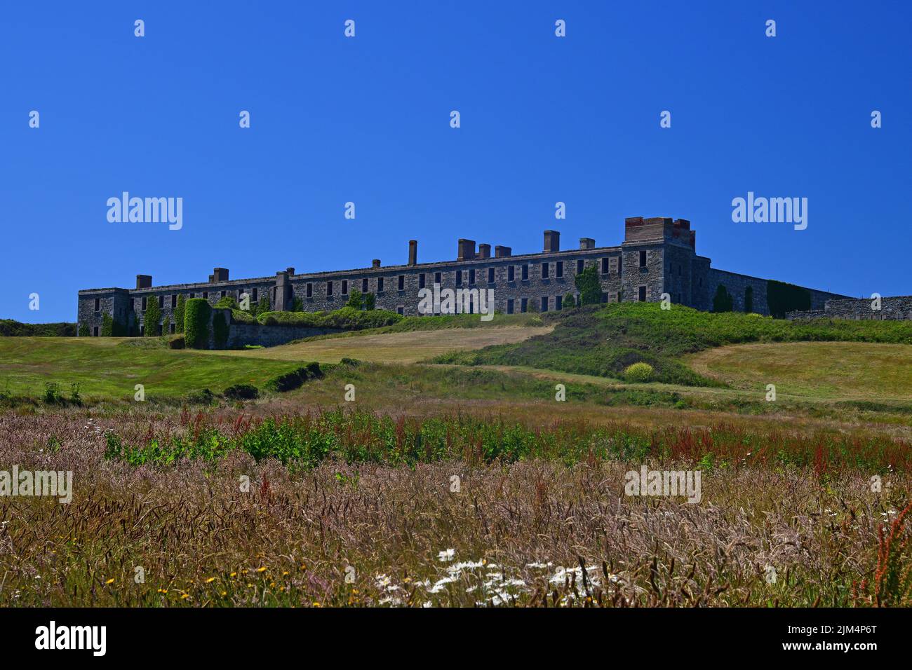 Built as a sizeable fort in Victorian times Fort Tourgis was used a defensive establishment by the German forces during WWII, Alderney, Channel Island Stock Photo