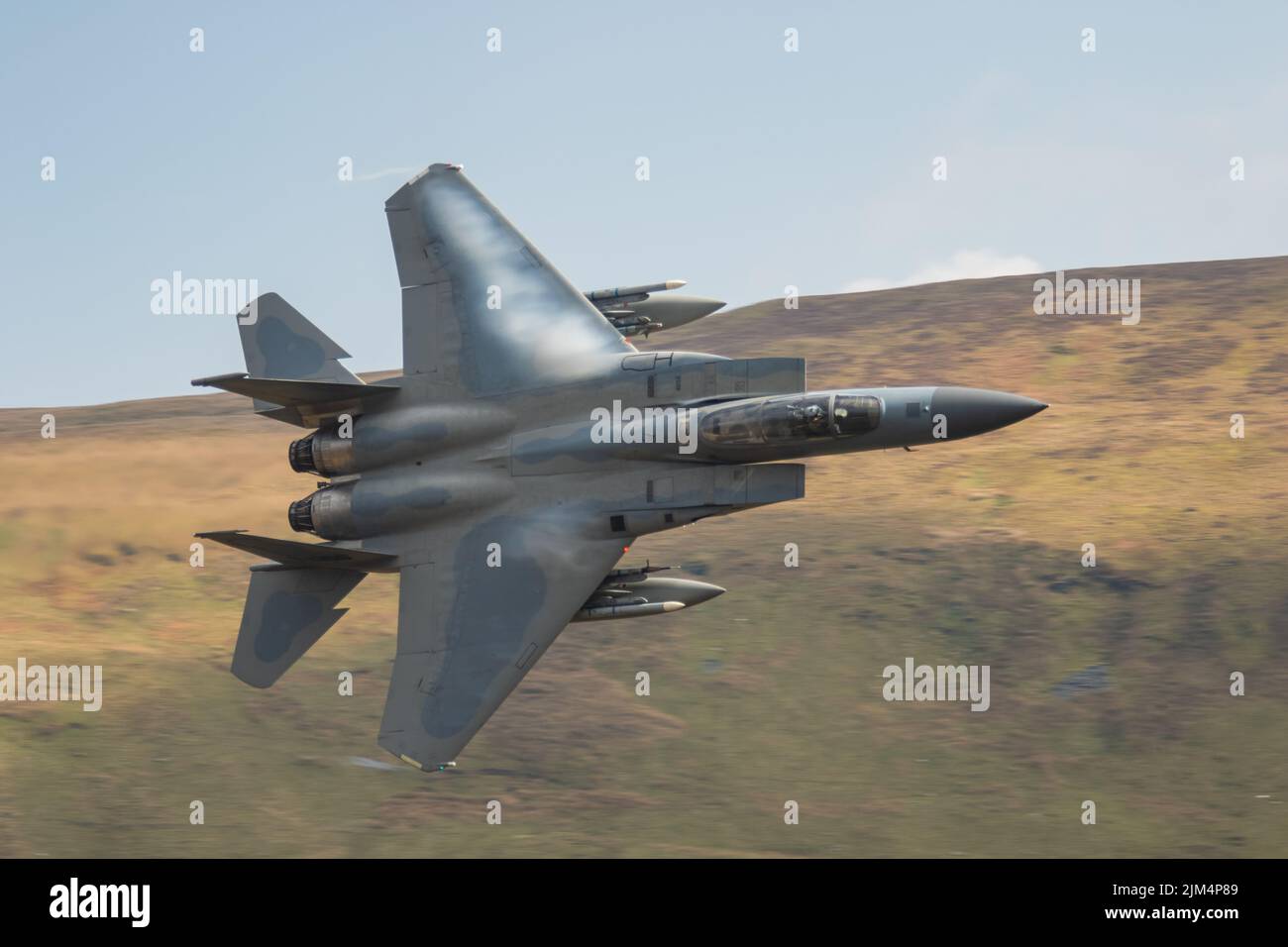 A closeup shot of a F15 flying in the Mach Loop Wales Stock Photo