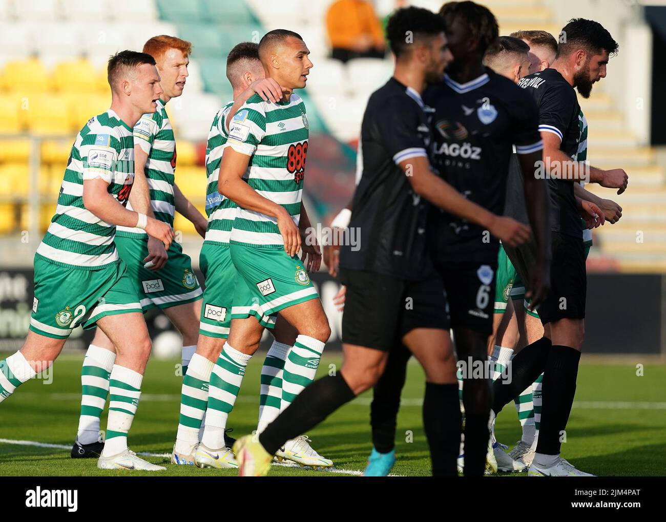 Shamrock Rovers' Graham Burke (centre) celebrates with team-mates after scoring his side's first goal from the penalty spot during the UEFA Europa League third qualifying round, first leg match at the Tallaght Stadium in Dublin, Ireland. Picture date: Thursday August 4, 2022. Stock Photo